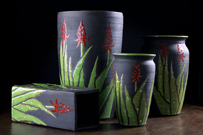 Three agave-themed ceramic pots