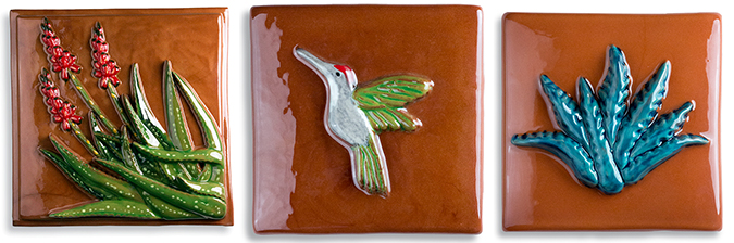 Three agave-themed ceramic tiles