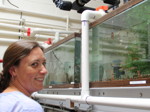 Educator views a tank