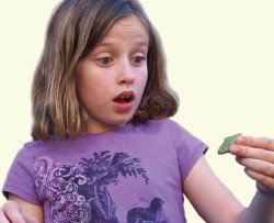 Girl is amazed by rock