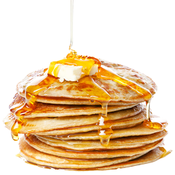Stack of pancakes with syrup poured over them