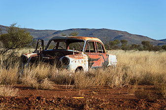 Old rusty car in the desert