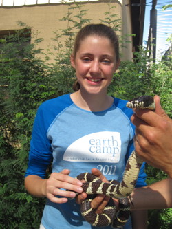 Girl holding a snake