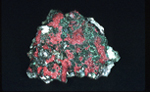 Pink and green mineral specimen