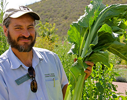 Educator with native crop