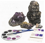 Amethysts next to purple paint palette